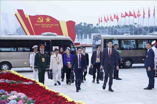 Delegates arrive for the opening session of the 14th National Congress of the Communist Party of Vietnam. Photo: VNA
