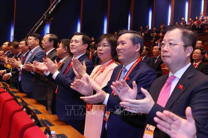 Đoàn đại biểu Đảng bộ Chính phủ dự phiên khai mạc Đại hội XIV của Đảng. Ảnh: TTXVN