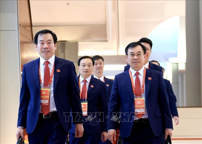 Delegates arrive for the opening session of the 14th National Congress of the Communist Party of Vietnam. Photo: VNA