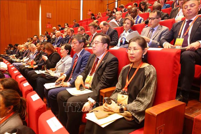 Các đại biểu quốc tế dự phiên khai mạc Đại hội XIV của Đảng. Ảnh: TTXVN