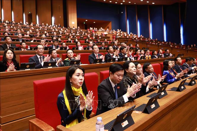 Đoàn đại biểu Đảng bộ tỉnh Lạng Sơn tham dự phiên khai mạc Đại hội. Ảnh: TTXVN