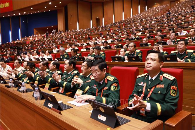 Các đại biểu dự phiên khai mạc Đại hội XIV của Đảng. Ảnh: TTXVN