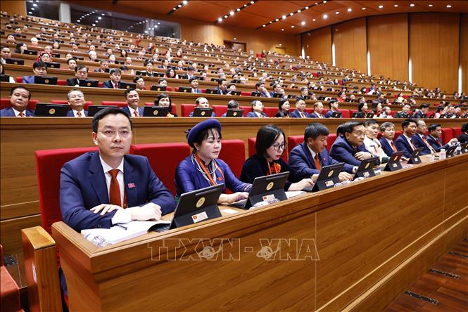 Đoàn đại biểu Đảng bộ tỉnh Lào Cai tham dự phiên khai mạc Đại hội XIV của Đảng. Ảnh: TTXVN 