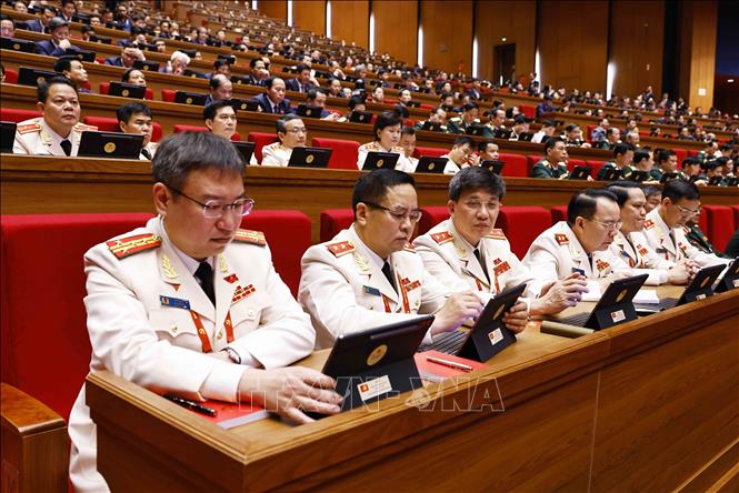 Đoàn đại biểu Đảng bộ Công an Trung ương tham dự phiên khai mạc Đại hội XIV của Đảng. Ảnh: TTXVN

