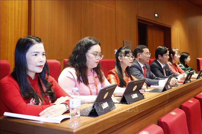 Đoàn đại biểu Đảng bộ tỉnh Lâm Đồng tham dự phiên khai mạc Đại hội XIV của Đảng. Ảnh: TTXVN