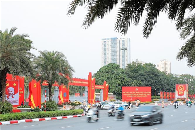 The National Convention Centre in Hanoi, where the National Party Congress is taking place, is decorated with red hues of national flags, panos and banners. VNA Photo