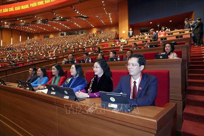 Đoàn đại biểu Đảng bộ tỉnh Nghệ An dự phiên khai mạc Đại hội XIV của Đảng. Ảnh: TTXVN