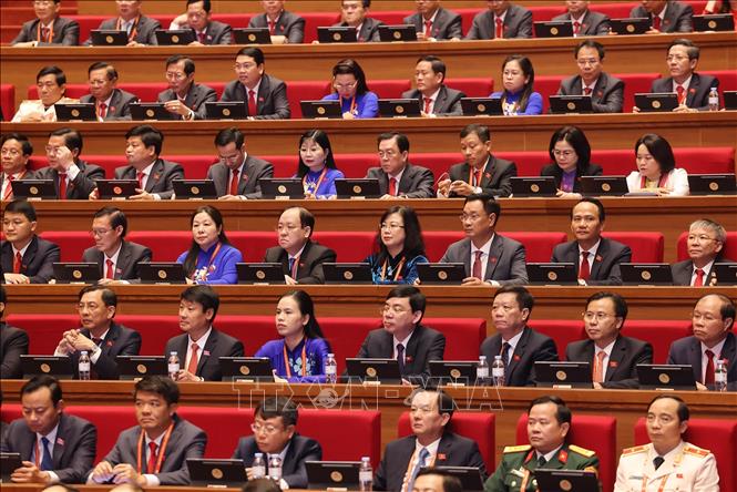 Các đại biểu dự phiên khai mạc Đại hội XIV của Đảng. Ảnh: TTXVN