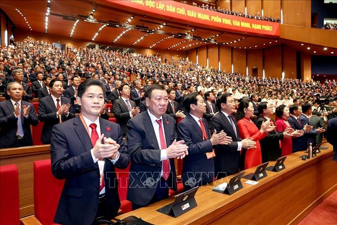 Đoàn đại biểu Đảng bộ Chính phủ dự phiên khai mạc Đại hội XIV của Đảng. Ảnh: TTXVN