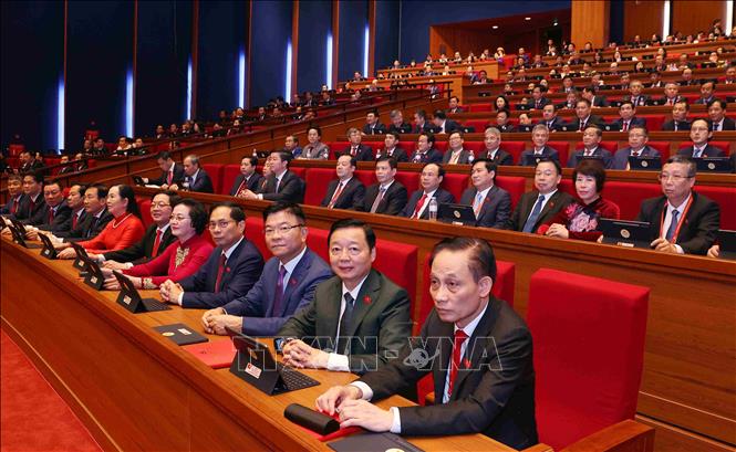 Các đại biểu Đoàn Đảng bộ Chính phủ tham dự phiên khai mạc Đại hội XIV của Đảng. Ảnh: TTXVN