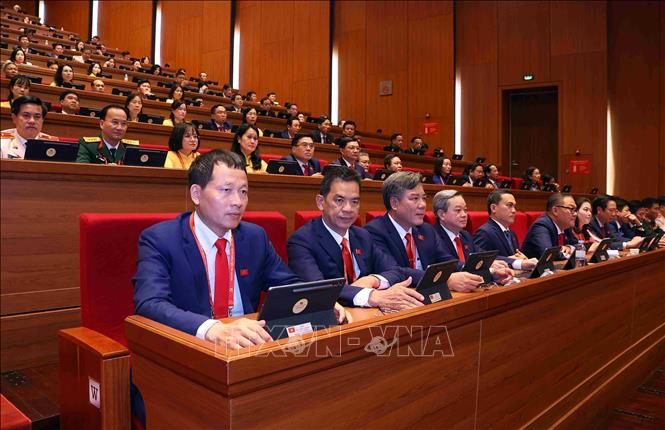 Các đại biểu tham dự phiên khai mạc Đại hội XIV của Đảng. Ảnh: TTXVN