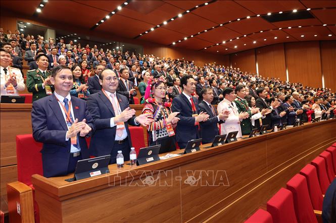 Đoàn đại biểu Đảng bộ tỉnh Điện Biên dự phiên khai mạc Đại hội XIV. Ảnh: TTXVN