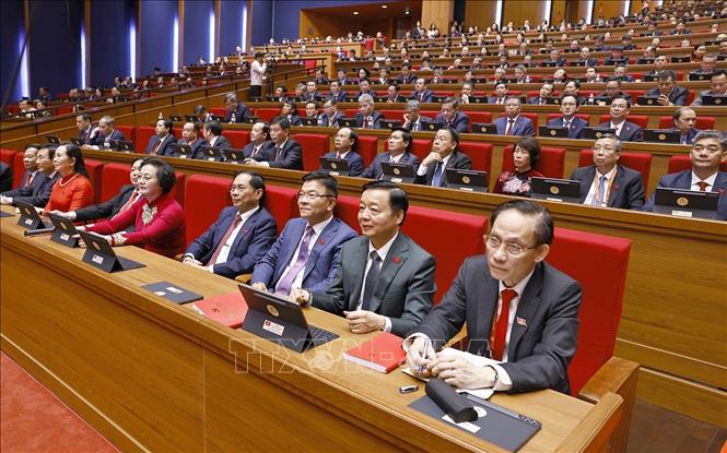 Đoàn đại biểu Đảng bộ Chính phủ dự phiên khai mạc Đại hội XIV của Đảng. Ảnh: TTXVN