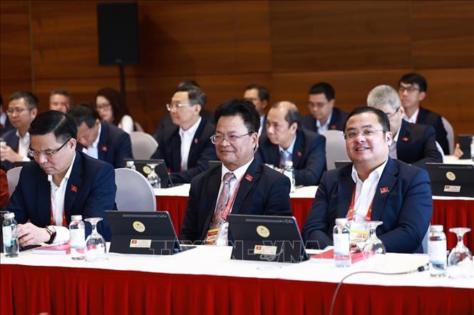 Các đại biểu thảo luận tại Đoàn. Ảnh: TTXVN