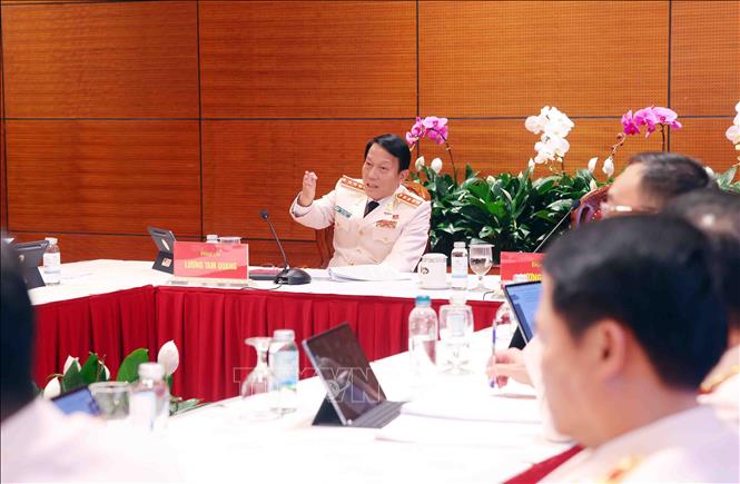 Đại tướng Lương Tam Quang, Ủy viên Bộ Chính trị, Bí thư Đảng ủy Công an Trung ương, Bộ trưởng Bộ Công an phát biểu tại phiên thảo luận các văn kiện Đại hội tại Đoàn Đảng bộ Công an Trung ương. Ảnh: TTXVN