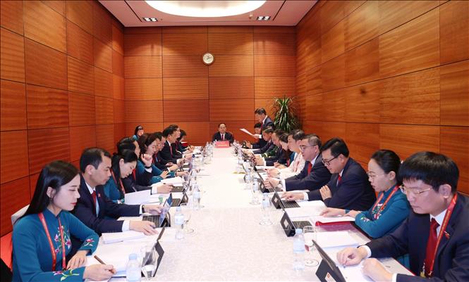 Đoàn đại biểu Đảng bộ tỉnh Quảng Ninh thảo luận các văn kiện Đại hội tại Đoàn. Ảnh: TTXVN. Ảnh: TTXVN