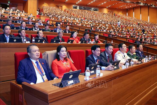 Đoàn đại biểu dự Phiên thảo luận tại hội trường về các văn kiện Đại hội, sáng 21/1. Ảnh: TTXVN