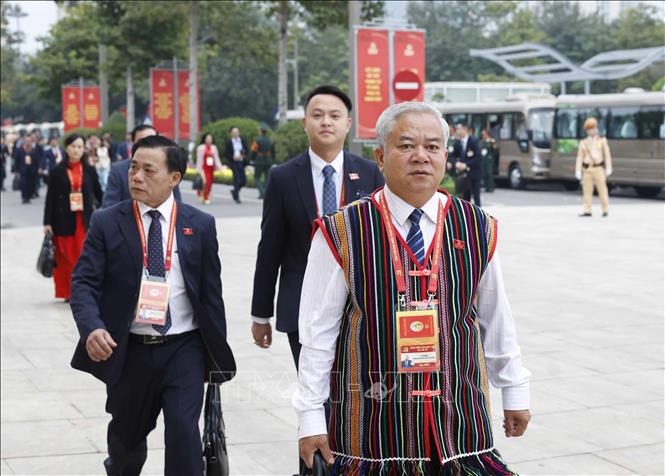 Các đại biểu đến dự phiên thảo luận tại hội trường về các văn kiện Đại hội. Ảnh: TTXVN