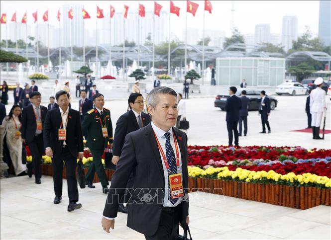 Các đại biểu đến dự phiên thảo luận tại hội trường về các văn kiện Đại hội. Ảnh: TTXVN