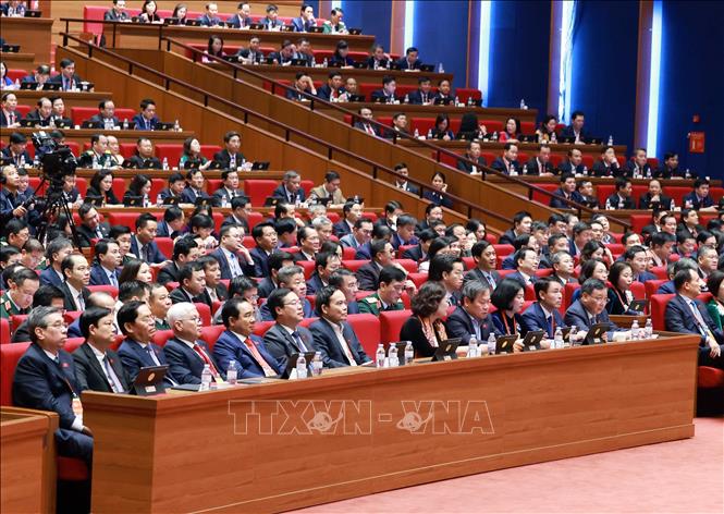 Các đại biểu dự phiên thảo luận tại hội trường về các văn kiện Đại hội, sáng 21/1. Ảnh: TTXVN
