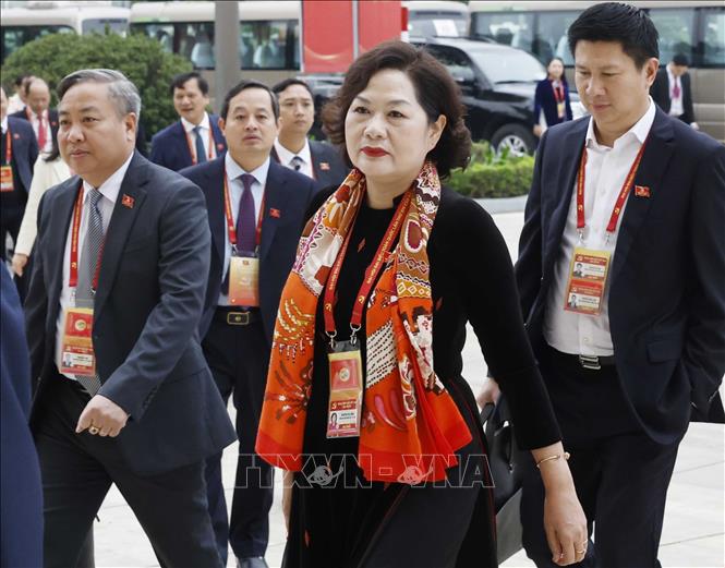 Các đại biểu đến dự phiên thảo luận tại hội trường về các văn kiện Đại hội. Ảnh: TTXVN