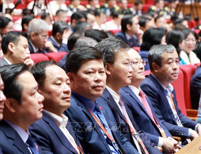 Đại biểu dự phiên thảo luận tại hội trường về các văn kiện Đại hội. Ảnh: TTXVN