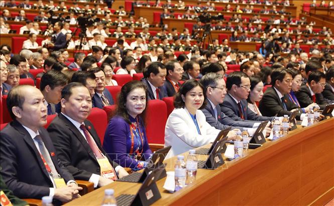 Đại biểu dự phiên thảo luận tại hội trường về các văn kiện Đại hội. Ảnh: TTXVN