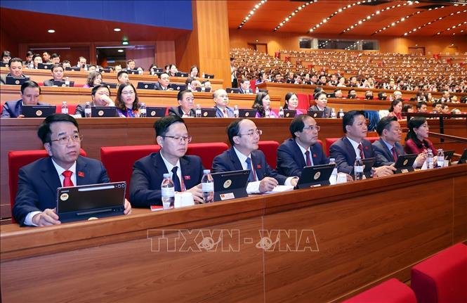 Đoàn đại biểu Đảng bộ tỉnh Thái Nguyên dự phiên thảo luận tại hội trường về các văn kiện Đại hội, sáng 21/1. Ảnh: TTXVN