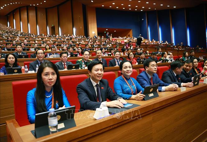 Đoàn đại biểu Đảng bộ tỉnh Lạng Sơn dự phiên thảo luận tại hội trường về các văn kiện Đại hội, sáng 21/1. Ảnh: TTXVN