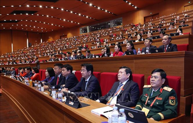 Đại biểu Đảng bộ tỉnh Khánh Hoà dự phiên thảo luận tại hội trường về các văn kiện Đại hội. Ảnh: TTXVN