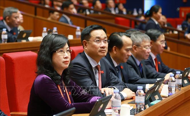 Đoàn đại biểu Đảng bộ Thành phố Đà Nẵng dự phiên thảo luận tại hội trường về các văn kiện Đại hội, sáng 21/1. Ảnh: TTXVN
