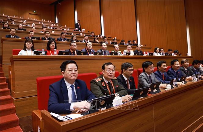 Đoàn đại biểu Đảng bộ tỉnh Tây Ninh dự phiên thảo luận tại hội trường về các văn kiện Đại hội, sáng 21/1. Ảnh: TTXVN