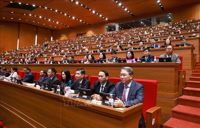 Đoàn đại biểu Đảng bộ tỉnh Đắk Lắk dự phiên thảo luận tại hội trường về các văn kiện Đại hội, sáng 21/1. Ảnh: TTXVN