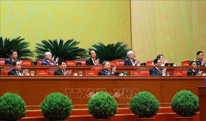 Đoàn Chủ tịch Đại hội tại phiên thảo luận, sáng 21/1. Ảnh: TTXVN
