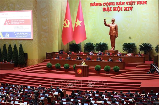 Phiên thảo luận tại hội trường về các văn kiện Đại hội. Ảnh: TTXVN
 