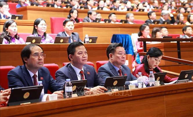 Đoàn đại biểu Đảng bộ tỉnh Thái Nguyên dự phiên thảo luận tại hội trường về các văn kiện Đại hội, sáng 21/1. Ảnh: TTXVN