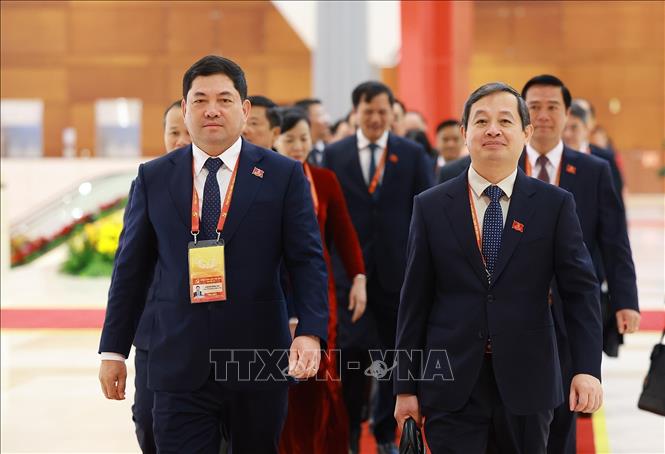 Các đại biểu đến dự ngày làm việc chính thức thứ ba Đại hội XIV của Đảng, sáng 22/1. Ảnh: TTXVN