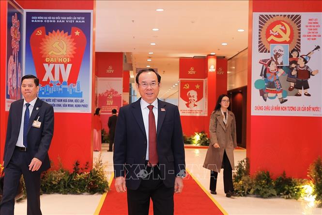 Đại biểu đến dự ngày làm việc chính thức thứ ba Đại hội XIV của Đảng, sáng 22/1. Ảnh: TTXVN