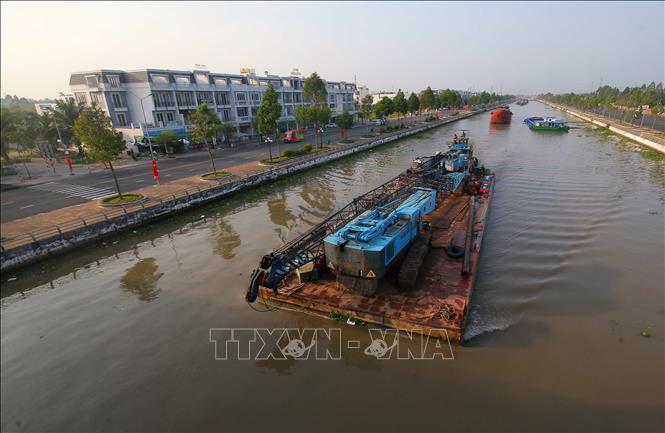 Tuyến kênh xáng Xà No do Trung ương quản lý là một trong những kênh giao thông thủy quan trọng vận chuyển hàng hóa tại địa bàn Cần Thơ. Ảnh: Duy Khương – TTXVN