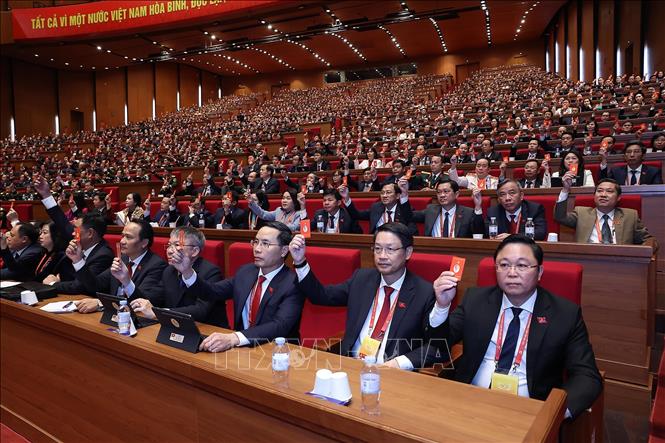 Đại hội biểu quyết thông qua số lượng Ủy viên BCH Trung ương Đảng khóa XIV. Ảnh: TTXVN