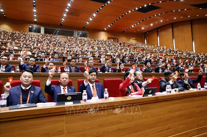 Đại hội biểu quyết thông qua số lượng Ủy viên BCH Trung ương Đảng khóa XIV. Ảnh: TTXVN