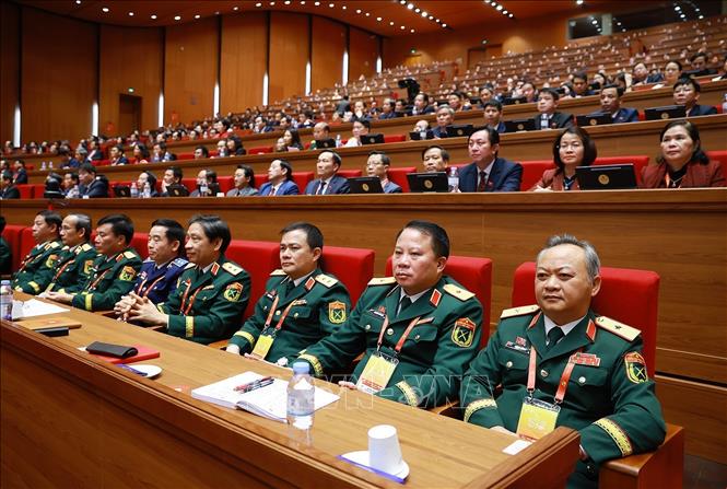 Đoàn đại biểu Đảng bộ Quân đội dự Đại hội, chiều 22/1. Ảnh: TTXVN
