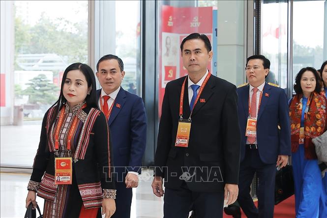 Các đại biểu đến dự phiên bế mạc Đại hội XIV của Đảng. Ảnh: TTXVN