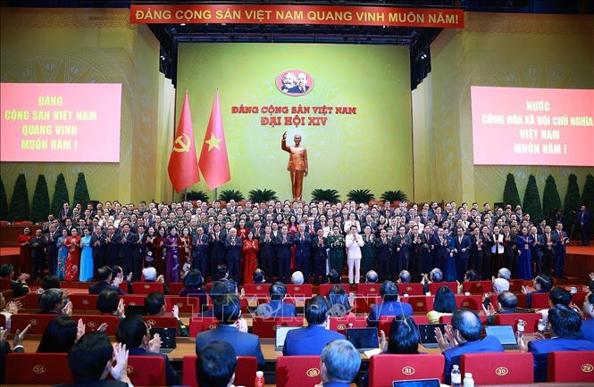 Delegates pose for a group photo at the 14th National Party Congress' closing ceremony. VNA Photo
