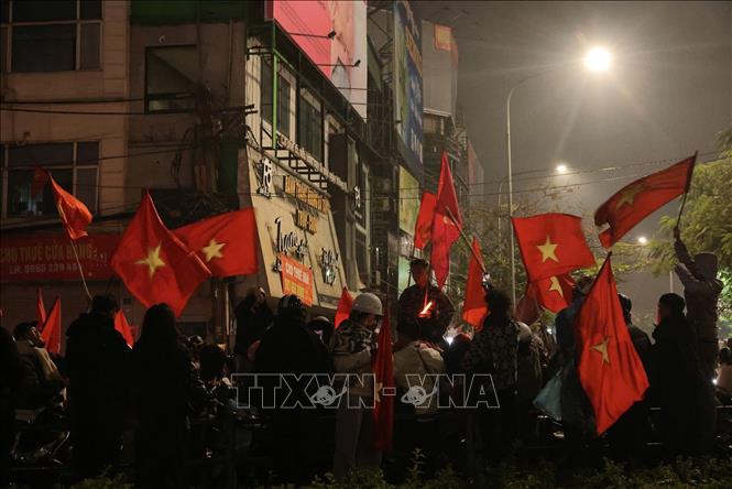 Hàng vạn người đổ ra diễu hành khắp các tuyến phố ăn mừng chiến thắng của U23 Việt Nam. Ảnh: Hoàng Hiếu - TTXVN