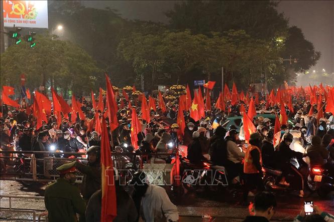 Hàng vạn người đổ ra diễu hành khắp các tuyến phố ăn mừng chiến thắng của U23 Việt Nam. Ảnh: Hoàng Hiếu - TTXVN