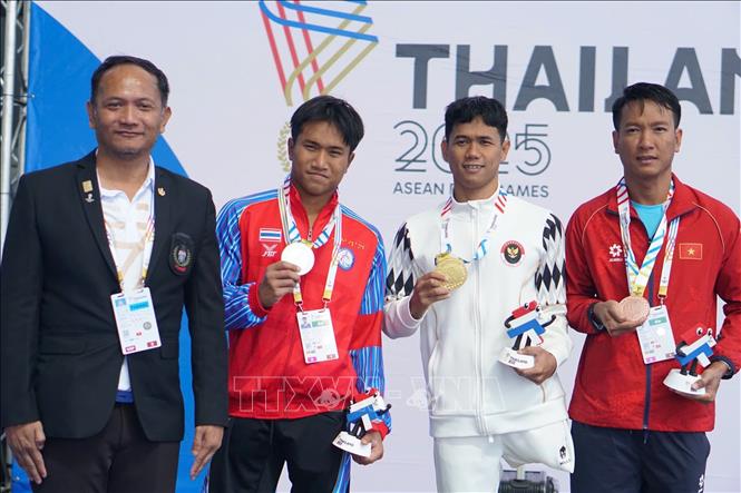 VĐV Phạm Thành Đạt giành HCĐ ở 50m bơi bướm nam hạng thương tật S9.  Ảnh: TTXVN phát   