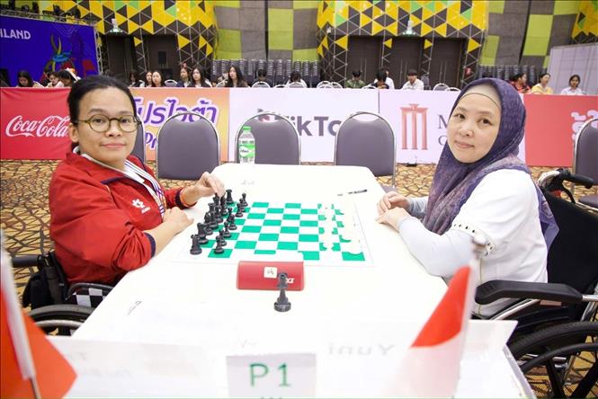 Kỳ thủ Đoàn Thu Huyền trong một nội dung thi đấu tại ASEAN Para Games 13. Ảnh: TTXVN phát