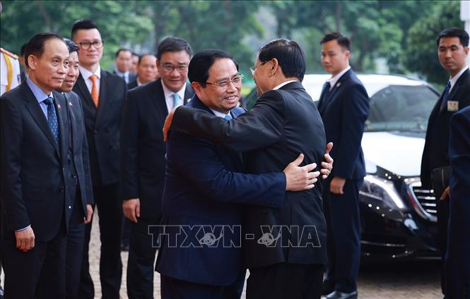 Thủ tướng Phạm Minh Chính hội kiến Tổng Bí thư, Chủ tịch nước Lào Thongloun Sisoulith. Ảnh: Dương Giang– TTXVN
