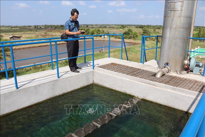 Nguồn nước cấp miễn phí cho người dân có chất lượng đạt chuẩn Bộ Y tế quy định. Ảnh: Thu Hiền - TTXVN